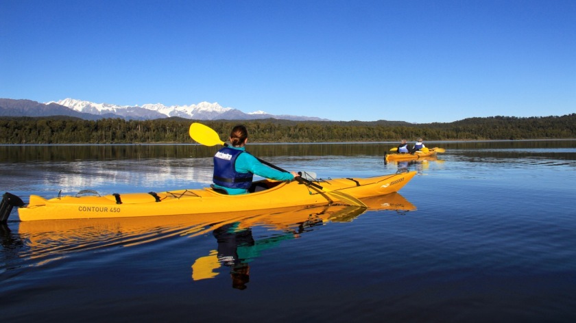 Kayaking on the West Coast of NZ with views of Mount Cook, NZ